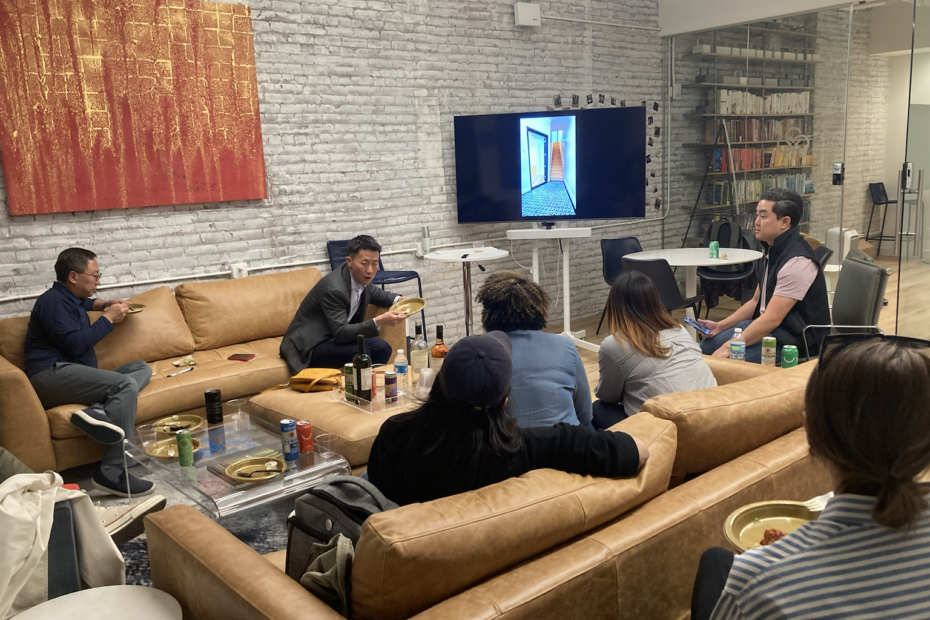 people gathered on couches listening