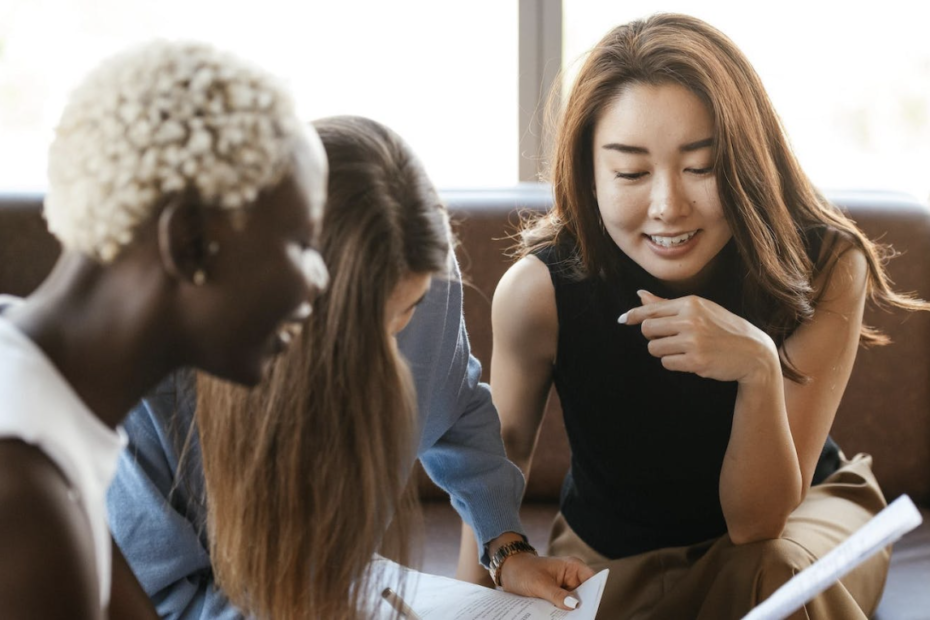 Diverse women conversing and supporting each other