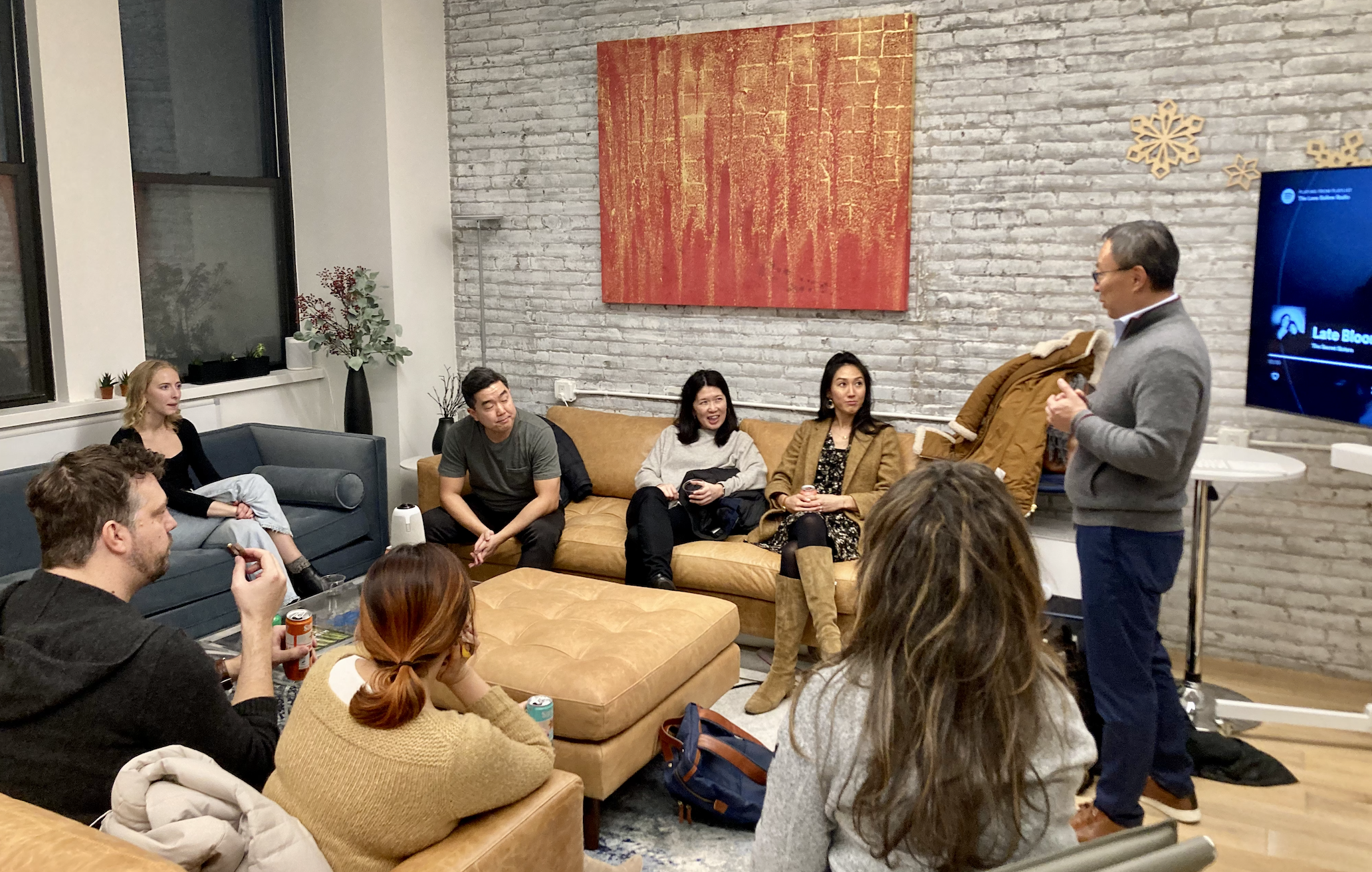 friends conversing in a living room