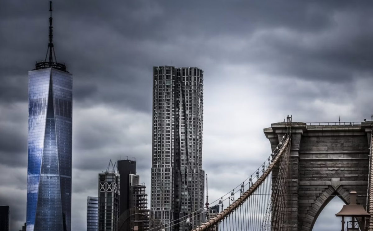 NYC skyline against stormy sky